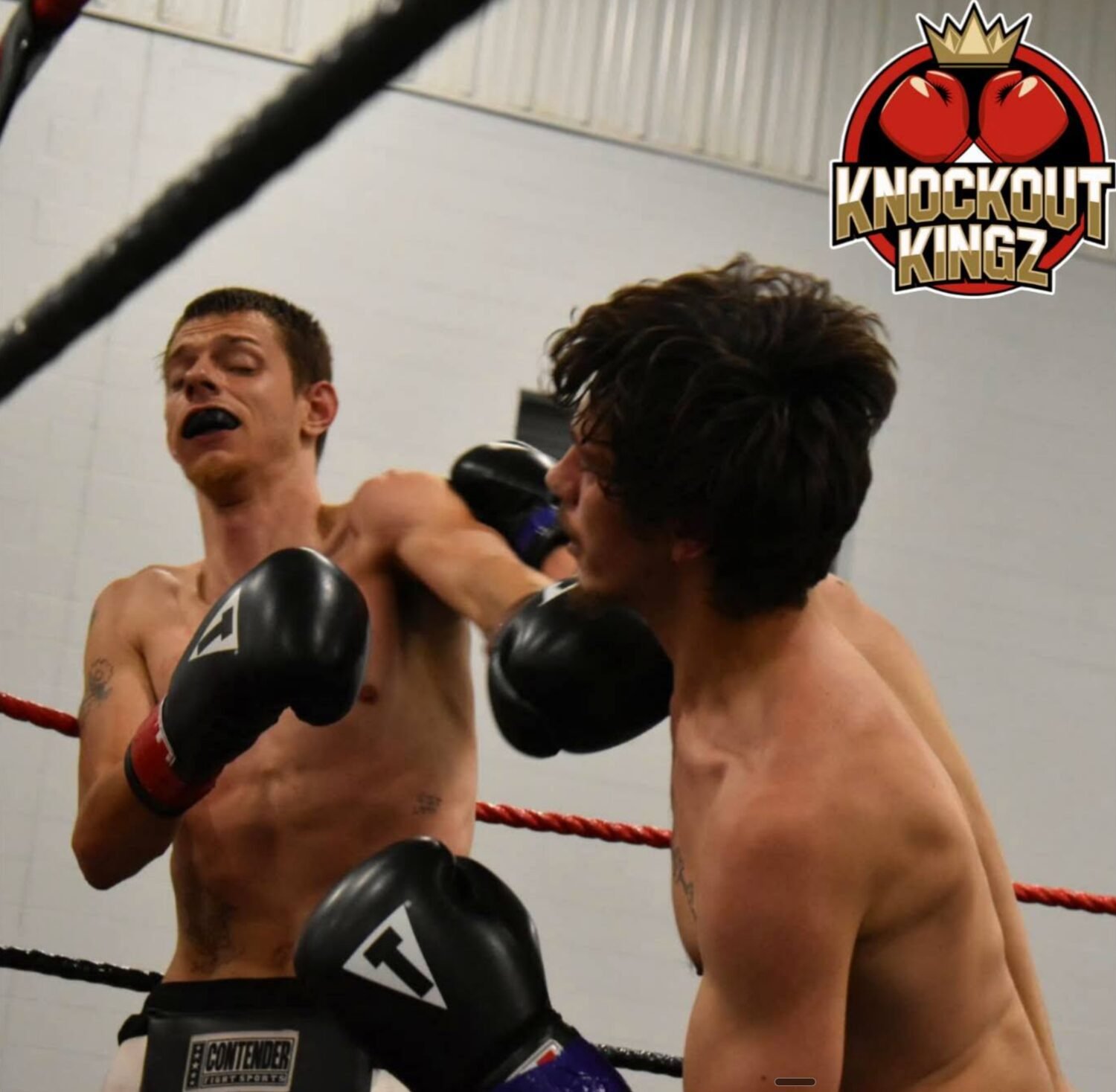 Two amateur boxers trading punches at a Knockout Kingz event