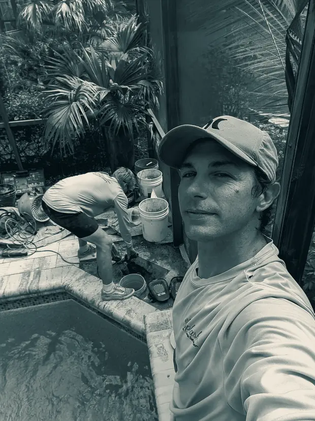 A Splash owner beside a pool during a repair